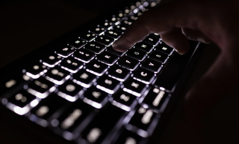 black keyboard with lit up keys to illustrate ai listening study